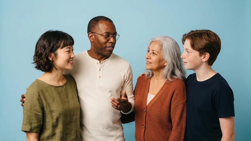 Diverse group of four people in relaxed conversation